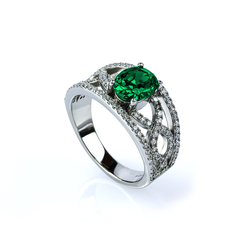 Oval Cut Emerald and Simulated Diamonds