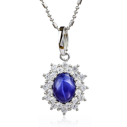 Blue Star Sapphire Oval Cut Cabuchon Halo Pendant