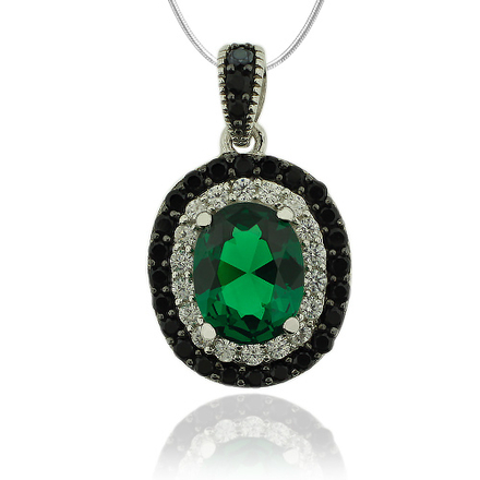 Sterling Silver Pendant With Oval Cut Emerald and Simulated Diamonds